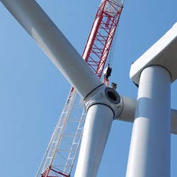 energy-renewable-wind-turbine-blades-being-installed-by-crane